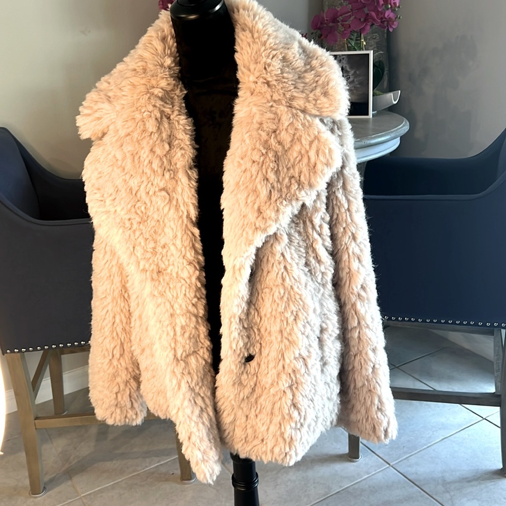 Pink teddy bear coat in a fluffy and soft